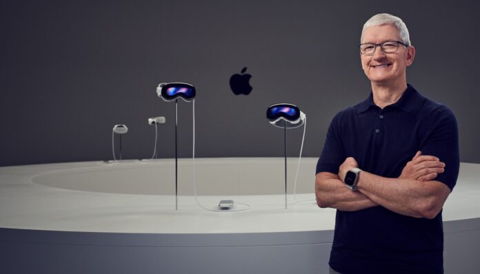 Apple CEO Tim Cook with Apple Vision Pro at Apple Park in June 2023