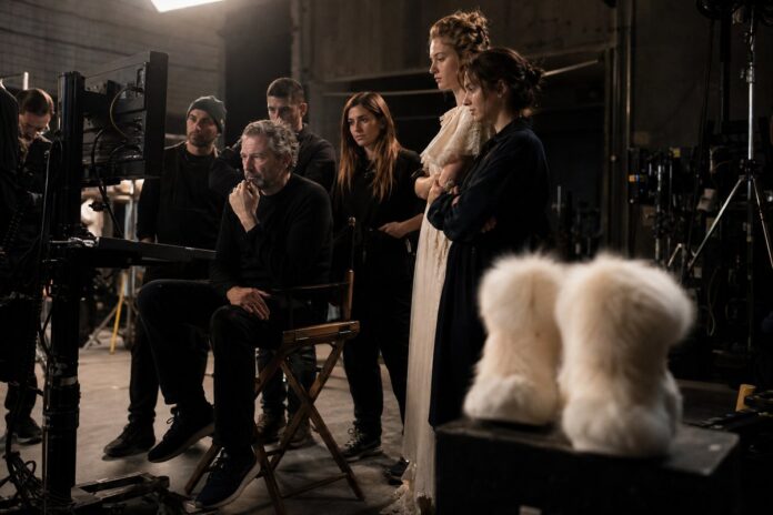 Christopher Nolan Explains the Simple Reason He Keeps Uggs Off His Sets
